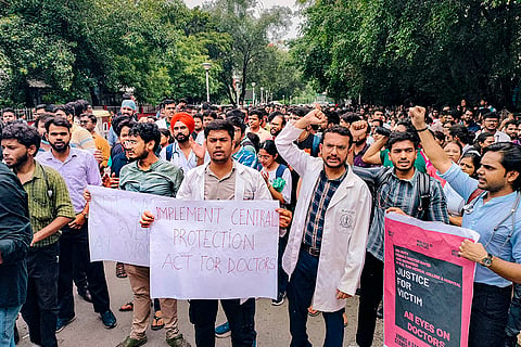 Medics stage a protest at Safdarjung Hospital, in New Delhi